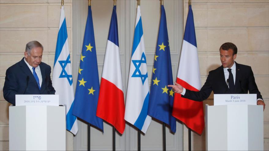 El presidente de Francia, Emmanuel Macron (dcha.), y el premier israelí, Benjamín Netanyahu, en una rueda de prensa en París, 5 de junio de 2018.