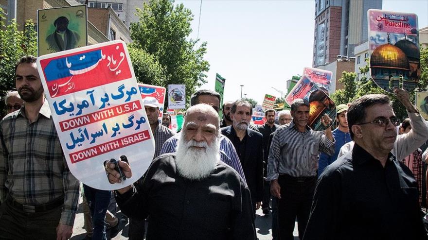 Ciudadanos iraníes participan en las marchas por el Día Mundial de Al-Quds, Teherán, 8 de junio de 2018.