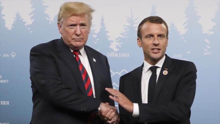 El presidente de EE.UU., Donald Trump (izq.), y el presidente francés, Emmanuel Macron, en la cumbre del G7 en Canadá, 8 de junio de 2018.