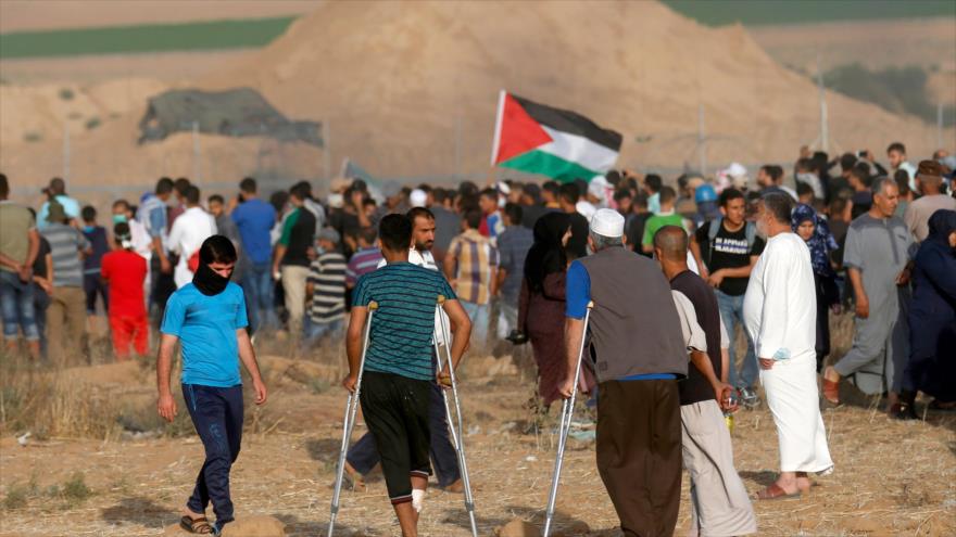 Palestinos durante las marchas en la Franja de Gaza, 22 de junio de 2018.