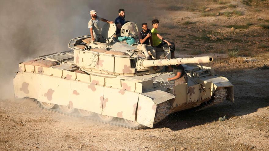 Varios rebeldes en la provincia de Daraa, en el sur de Siria, 23 de junio de 2018.