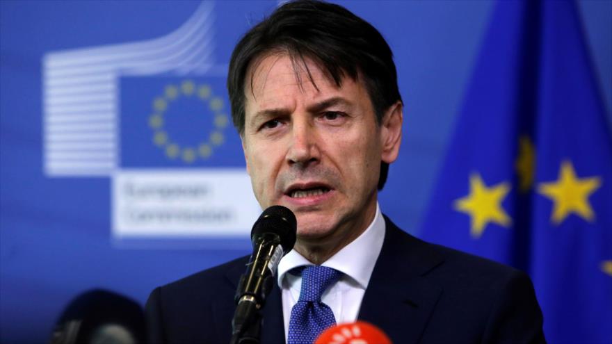El primer ministro de Italia, Giuseppe Conte, en una conferencia de prensa en Bruselas, 24 de junio de 2018. 