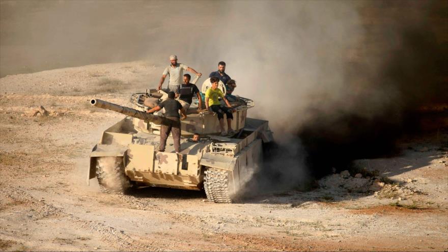 Un grupo de rebeldes en la provincia de Daraa, en el sur de Siria, 23 de junio de 2018.
