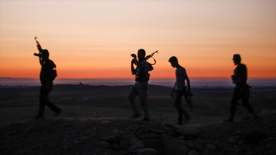 Integrantes de los grupos armados en Daraa, 3 de julio de 2018.