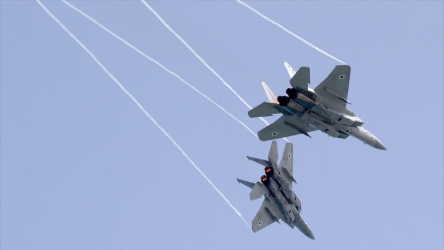 Cazas F-15 de la fuerza aérea israelí durane un espectáculo aéreo en Tel Aviv, 12 de abril de 2018.