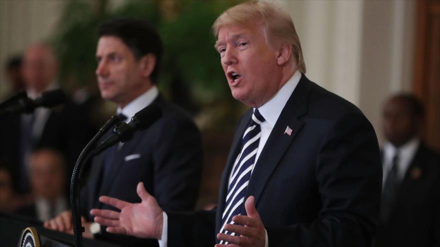 El presidente de EE.UU., Donald Trump (dcha.), y el premier italiano, Giuseppe Conte, en una conferencia de prensa, la Casa Blanca, 30 de julio de 2018.