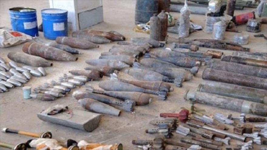 Armas y municiones descubiertas por las fuerzas sirias en la provincia de Rif Damasco, 31 de julio de 2018.