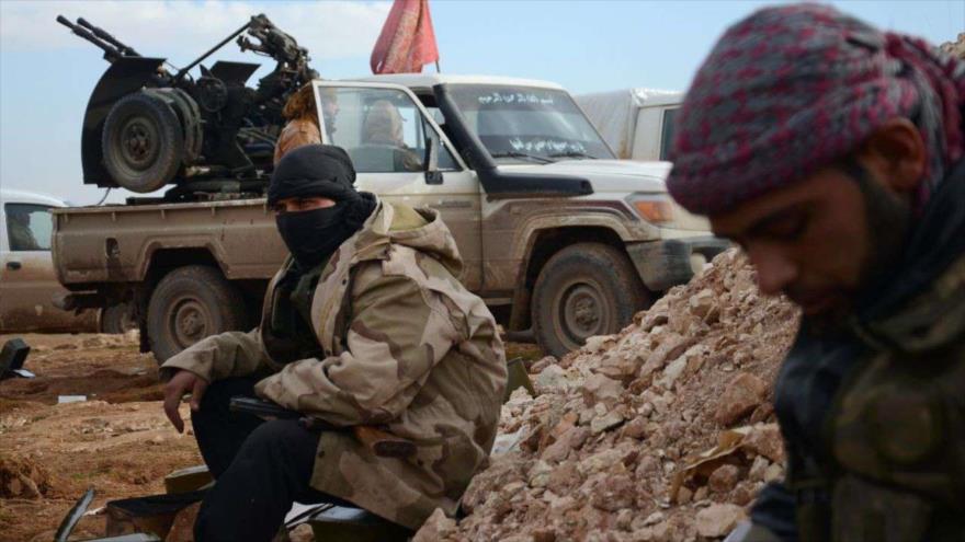 Los combatientes del llamado Ejército Libre de Siria (ELS) cerca de la ciudad de Qabasin, ubicada al noreste de Alepo.