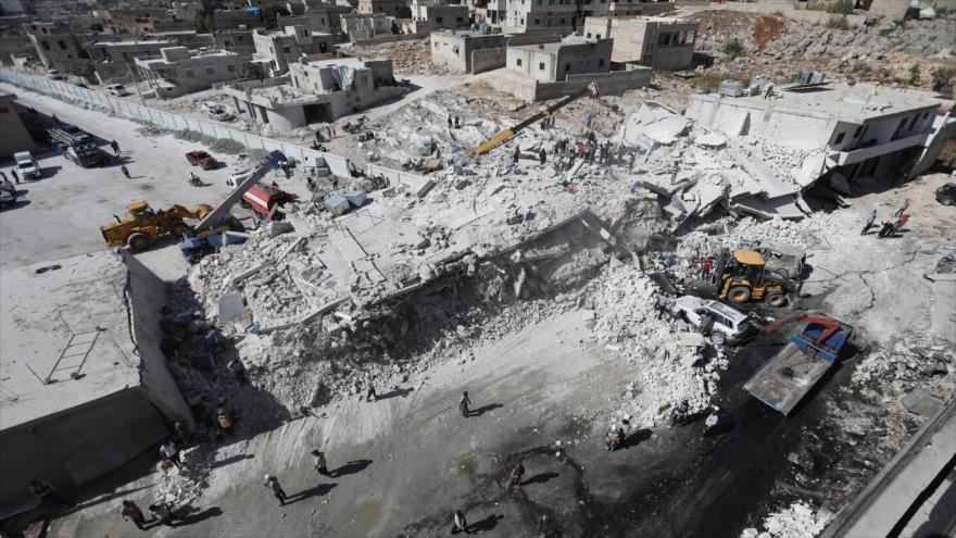 Zona afectada por la explosión de un almacén de armas en una zona residencial de Sarmada, en Idlib (norte de Siria), 12 de agosto de 2018 (Foto: AFP).