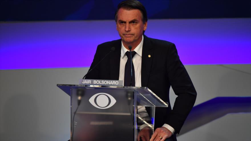 El candidato presidencial brasileño Jair Bolsonaro, durante el primer debate presidencial, Sao Paulo, Brasil, 9 de agosto de 2018. Foto: AFP.