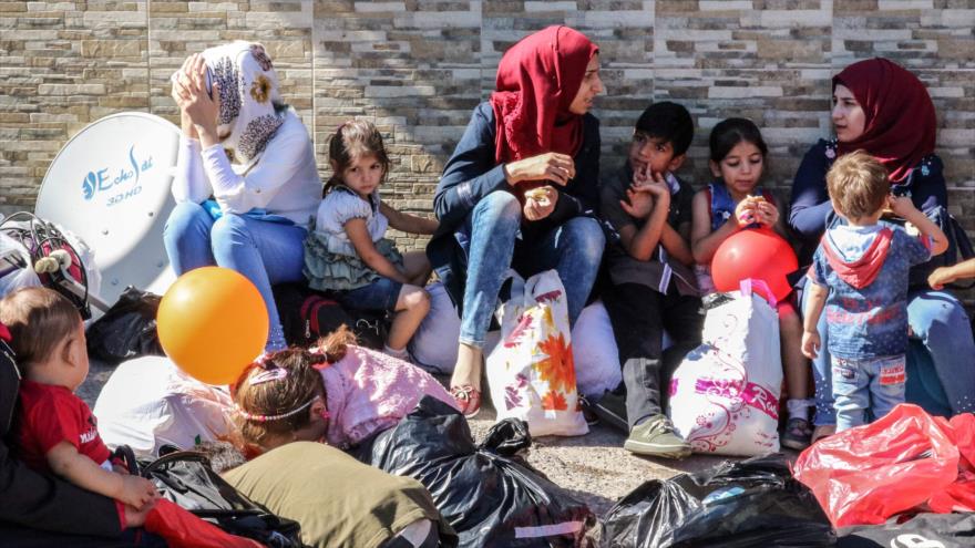 Refugiados sirios regresan a su país desde El Líbano, 28 de julio de 2018. (Foto: AFP)