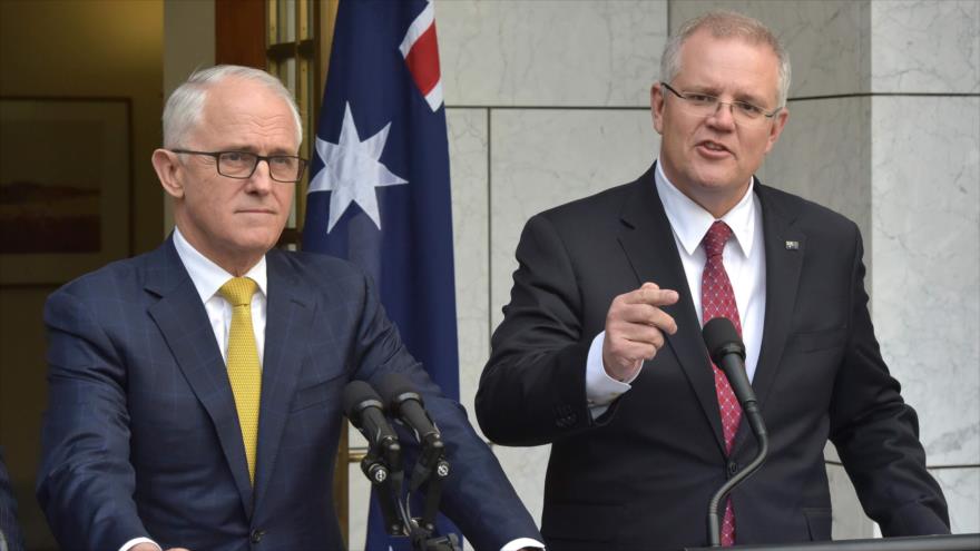 Scott Morrison (dcha.), nuevo primer ministro de Australia, junto al premier saliente Malcolm Turnbull en una rueda de prensa, 22 de agosto de 2018. (Foto:AFP)