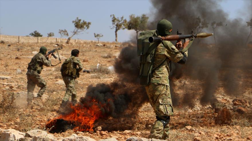 Los ‘rebeldes’ realizan un ejercicio militar en la provincia siria de Idlib, 11 de septiembre de 2018. (Foto: AFP) 