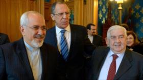 Al-Moalem aborda la situación de Siria con Zarif y Guterres