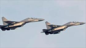Aviones chinos realizan simulacro con fuego vivo en mar del Sur