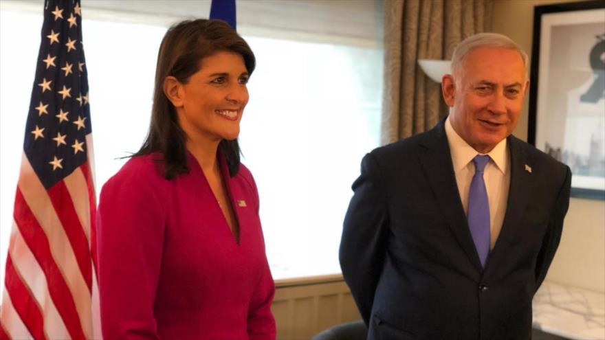 La embajadora de EE.UU. ante la ONU, Nikki Haley, y el primer ministro israelí, Benjamín Netanyahu, respectivamente.