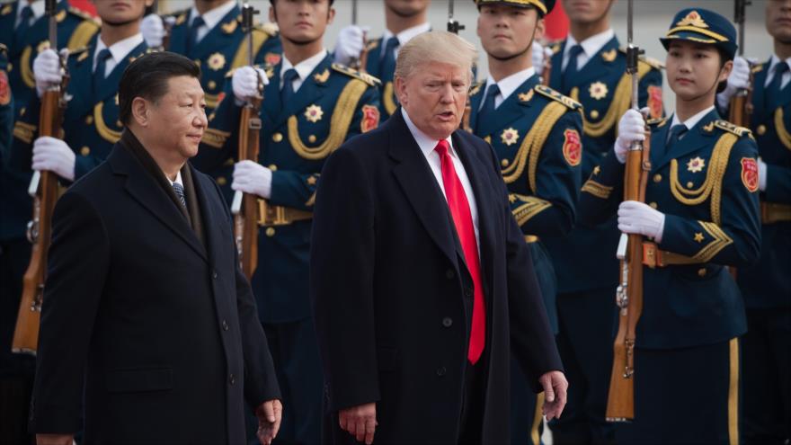 El presidente de EE.UU., Donald Trump, (dcha.) y su par de China, Xi Jinping, en Pekín, 9 de noviembre de 2017. (Foto: AFP)