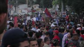 Hondureños protestan en favor de caravana de migrantes 