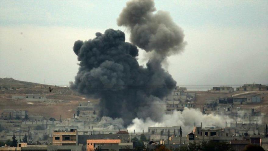 Un ataque aéreo llevado a cabo por la coalición anti-EIIL en Siria.