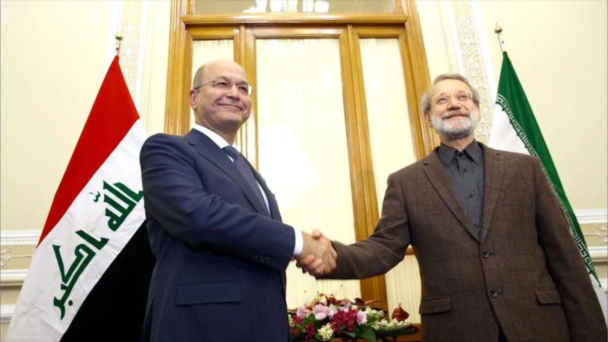 El presidente del Parlamento iraní, Ali Lariyani (dcha.), y el presidente iraquí, Barham Salih, 17 de noviembre de 2018. (Fuente: Icana)