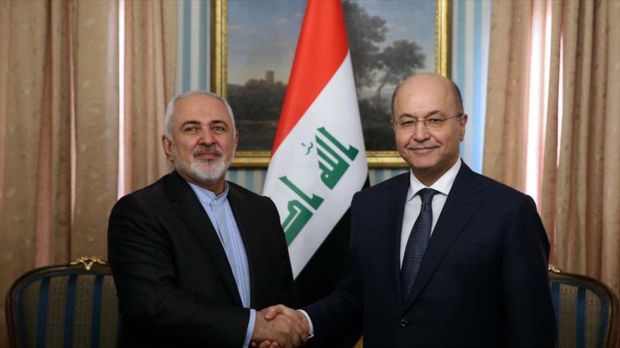 El canciller iraní, Mohamad Yavad Zarid (izda.), y el presidente iraquí, Barham Salih, Teherán (capital iraní), 17 de noviembre de 2018. (Foto: IRNA)