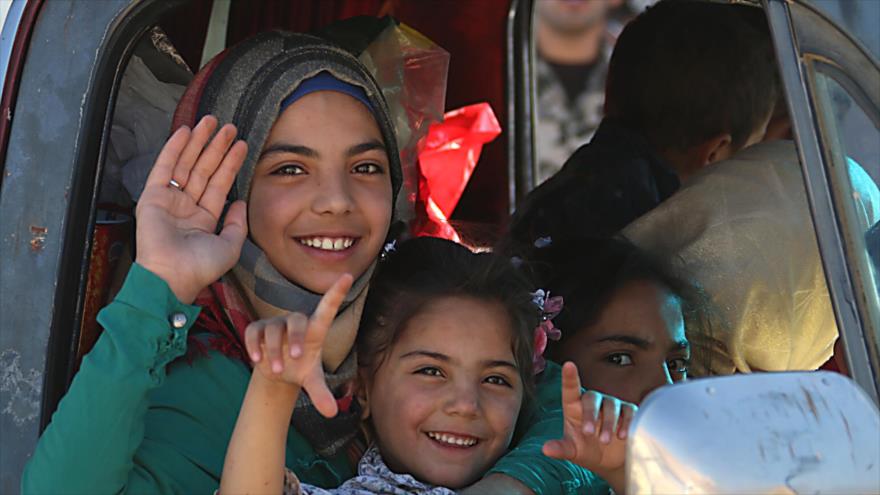 Refugiados sirios regresan a su país desde El Líbano, 7 de julio de 2018. (Foto: AFP)
