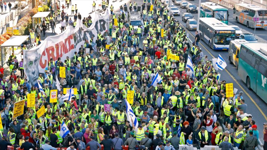 Israelíes se manifiestan contra las condiciones de vida y la corrupción en Tel Aviv, 14 de diciembre de 2018. (Foto: AFP)