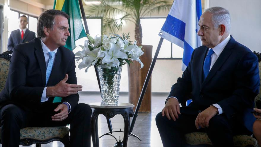 El presidente electo de Brasil, Jair Bolsonaro (izq.), se reúne con el premier israelí, Benjamín Netanyahu, en Río de Janeiro, 28 de diciembre de 2018. (Foto: AFP)