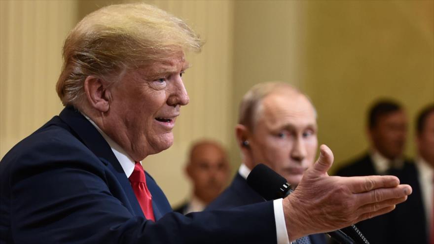 El presidente de EE.UU., Donald Trump (izq.), y su par ruso, Vladimir Putin, en una rueda de prensa en Helsinki, 16 de julio de 2018. (Foto: AFP)