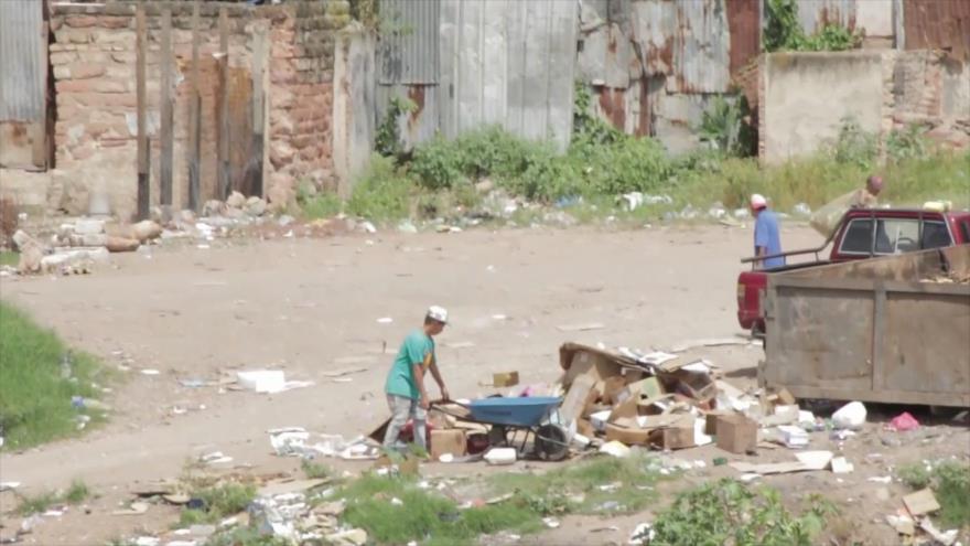 Honduras es un país productor de pobreza, según expertos