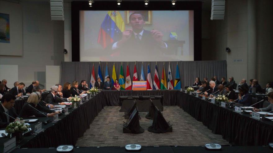 El opositor golpista venezolano, Juan Guaidó, habla vía videoconferencia en la reunión del Grupo de Lima, Ottawa, 4 de febrero de 2019. (Foto: AFP)