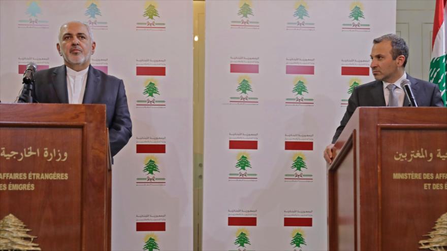 El canciller iraní, Mohamad Yavad Zarif (izda.), y su par libanés, Yebran Basil, en una rueda de prensa en Beirut, 11 de febrero de 2019. (Foto: AFP)