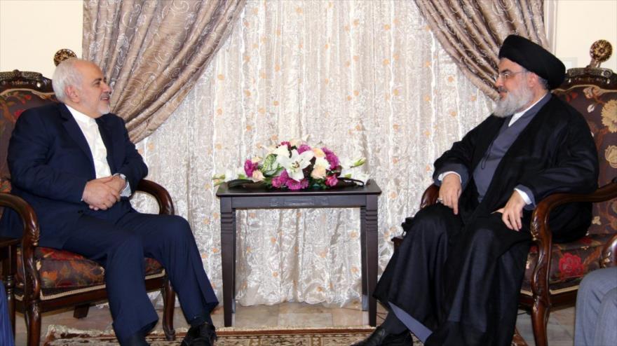 El canciller iraní, Mohamad Yavad Zarif (izda.), y el líder de Hezbolá, Seyed Hasan Nasralá, en Beirut, 11 de febrero de 2019. (Foto: AFP)