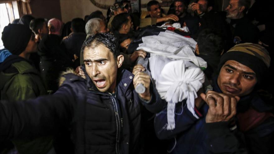 Funeral de un joven palestino, muerto por disparos de las fuerzas israelíes en una protesta en Gaza, 26 de enero de 2019. (Foto: AFP)