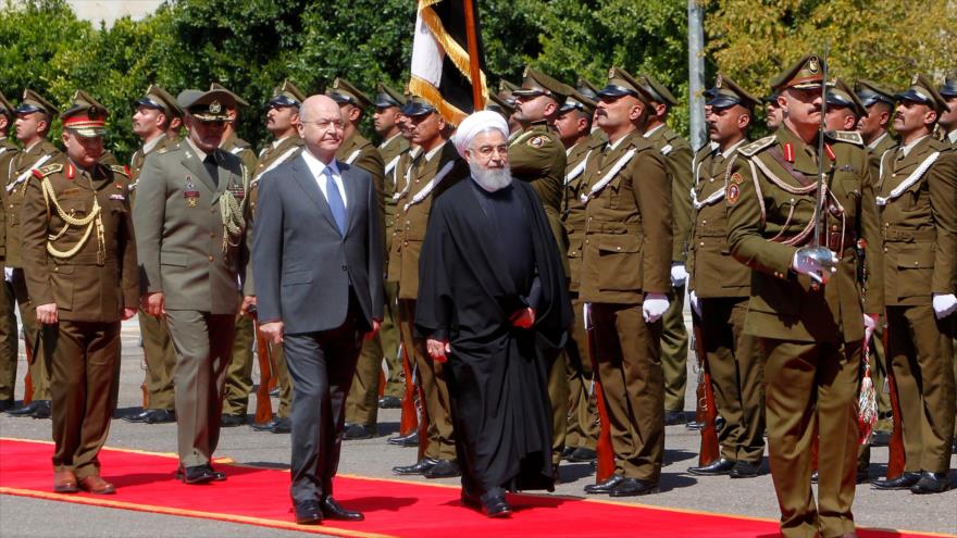 A diferencia de Trump, Rohani visita Irak a plena luz del día