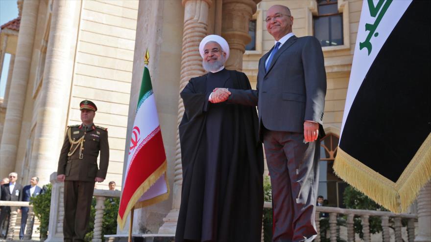 El presidente de Irán, Hasan Rohani (izq.), y su par iraquí, Barham Salih, Bagdad, capital de Irak, 11 de marzo de 2019. (Foto: AFP)