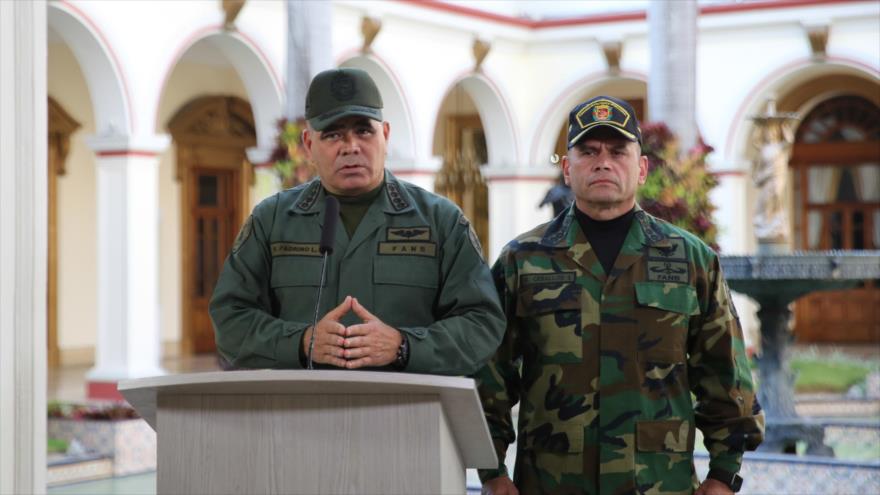 El ministro de Defensa de Venezuela, Vladimir Padrino López (izda.), en el Palacio de Miraflores, Caracas, 10 de marzo de 2019. (Fuente: AFP)