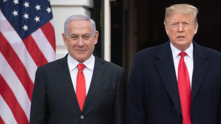 El presidente de EE.UU., Donald Trump (dcha.), y el primer ministro israelí, Benjamín Netanyahu, en la Casa Blanca, 25 de marzo de 2019. (Foto: AFP)