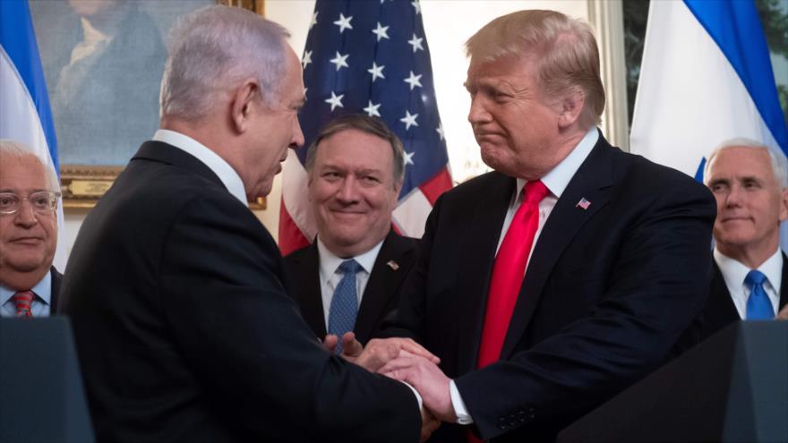 El premier israelí, Benjamín Netanyahu (izda.), y el presidente de EE.UU., Donald Trump, en la Casa Blanca, 25 de marzo de 2019. (Foto: AFP)