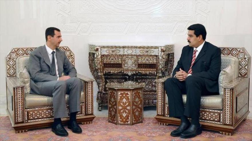 El presidente sirio, Bashar al-Asad, se reúne con el entonces ministro de Exteriores de Venezuela, Nicolás Maduro, octubre de 2009.