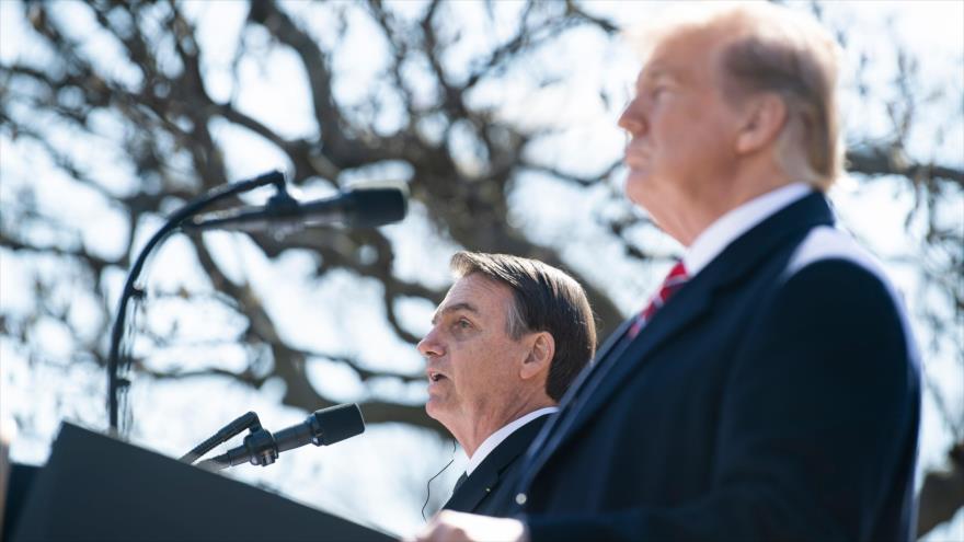 El presidente de EE.UU., Donald Trump (dcha.), y su par de Brasil, Jair Bolsonaro, en la Casa Blanca, 19 de marzo de 2019. (Foto: AFP)