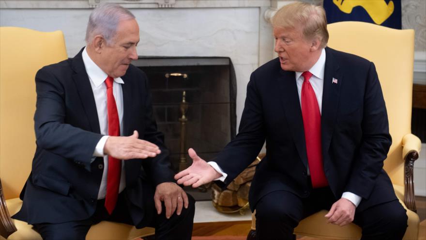 El presidente de EE.UU., Donald Trump (dcha.), y el premier de Israel, Benjamín Netanyahu, en la Casa Blanca, 25 de marzo de 2019. (Foto: AFP)