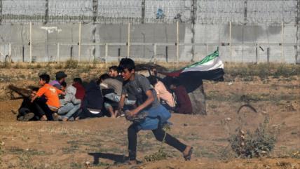 Un palestino muerto y 30 heridos por disparos israelíes en Gaza