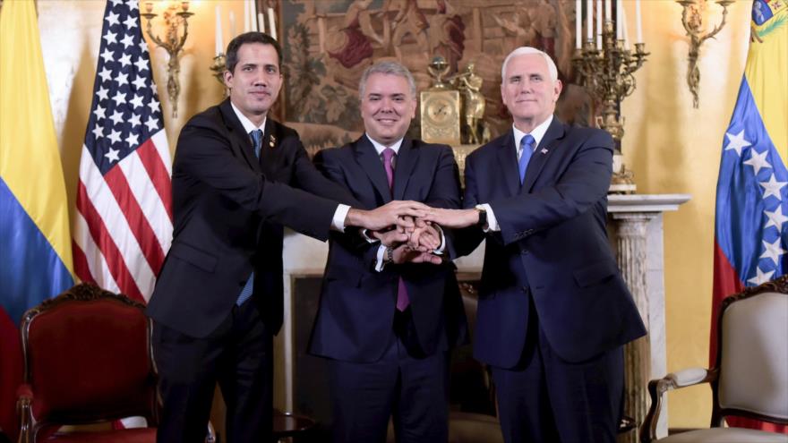 El venezolano Juan Guaidó (izq.); el presidente colombiano, Iván Duque; y el vicepresidente de EE.UU., Mike Pence, 25 de febrero de 2019. (Foto: AFP)