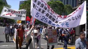 Los japoneses se manifiestan por la presencia de Trump en su país