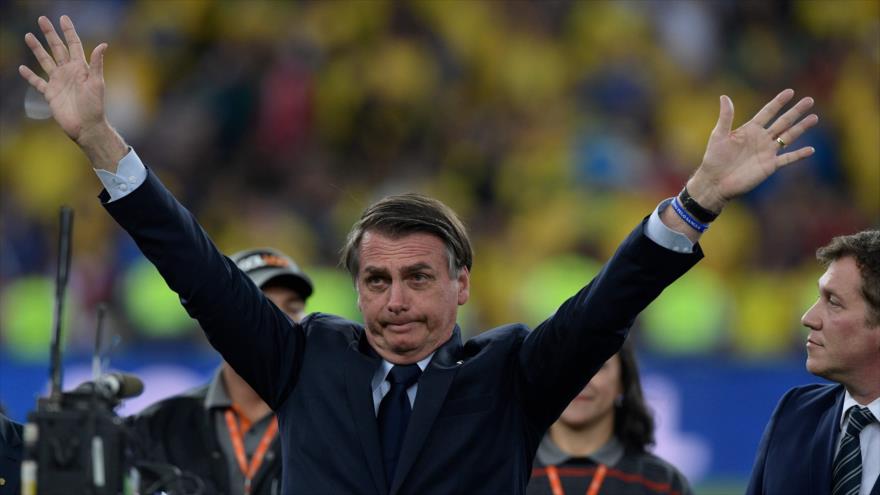 El presidente de Brasil, Jair Bolsonaro, en el partido final entre Brasil y Perú, 7 de julio 2019. (Foto: AFP)
