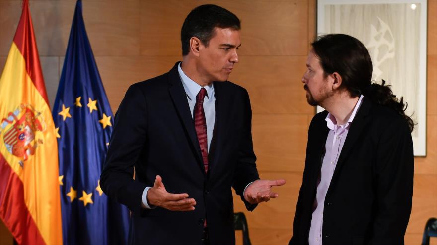 El presidente del Gobierno español, Pedro Sánchez (izda.), y el líder de Unidas Podemos, Pablo Iglesias, en Madrid, 9 de julio de 2019. (Foto: AFP)