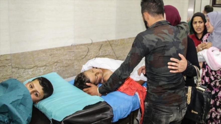 Niños heridos por un ataque terrorista en la provincia de Alepo, en el noroeste de Siria, 14 de julio de 2019. (Foto: SANA)