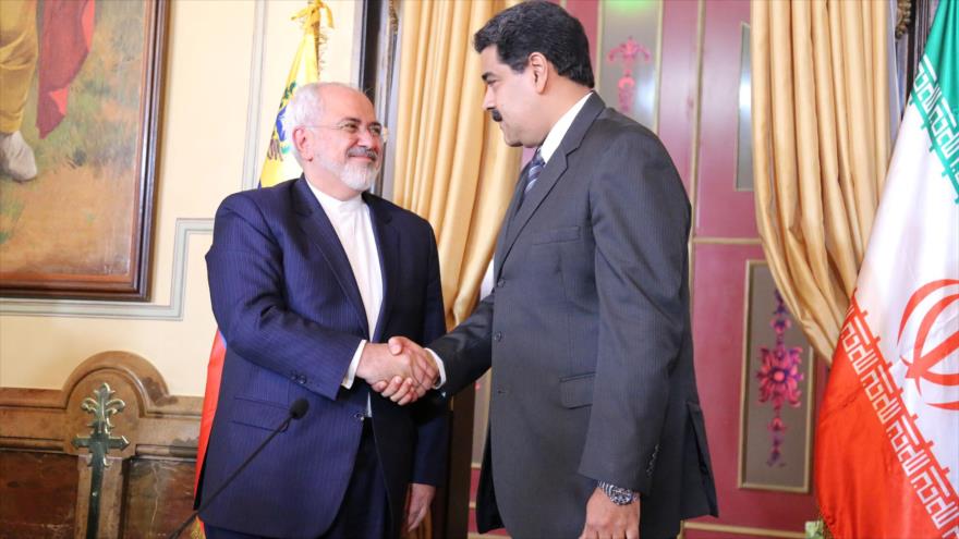 El canciller iraní, Mohamad Yavad Zarif, reunido con el presidente venezolano, Nicolás Maduro, en el Palacio de Miraflores, Caracas, 27 de agosto de 2016.