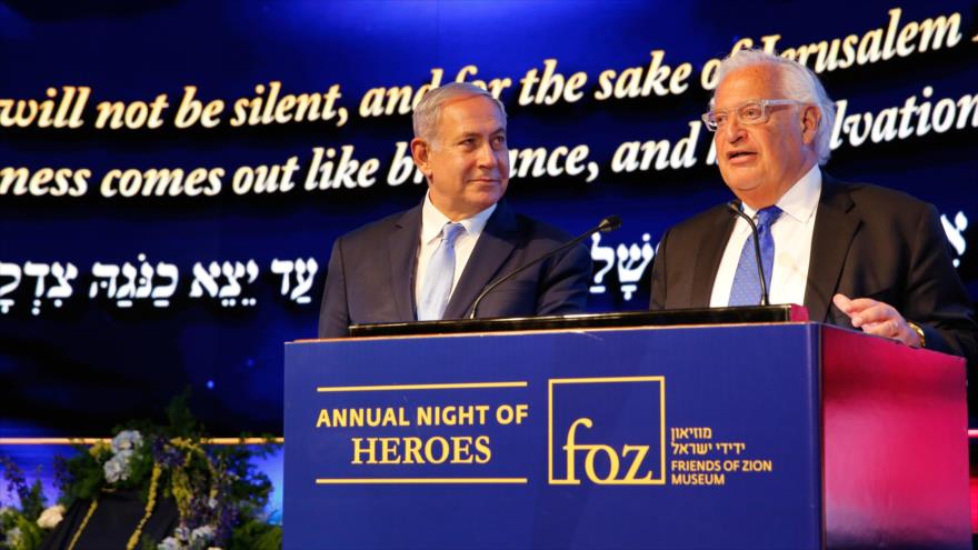 El premier israelí, Benjamín Netanyahu (izda.), y el embajador de EE.UU. ante Israel, David Friedman, Al-Quds (Jerusalén), 14 de mayo de 2019. (AFP)